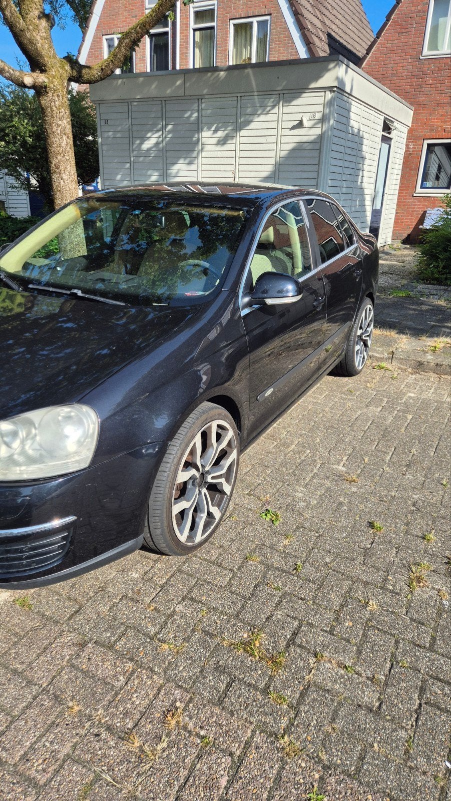 Volkswagen Jetta 2.0 FSI 110KW AUT 2007 Zwart, Auto's, 4 cilinders, Origineel Nederlands, Particulier, Sedan