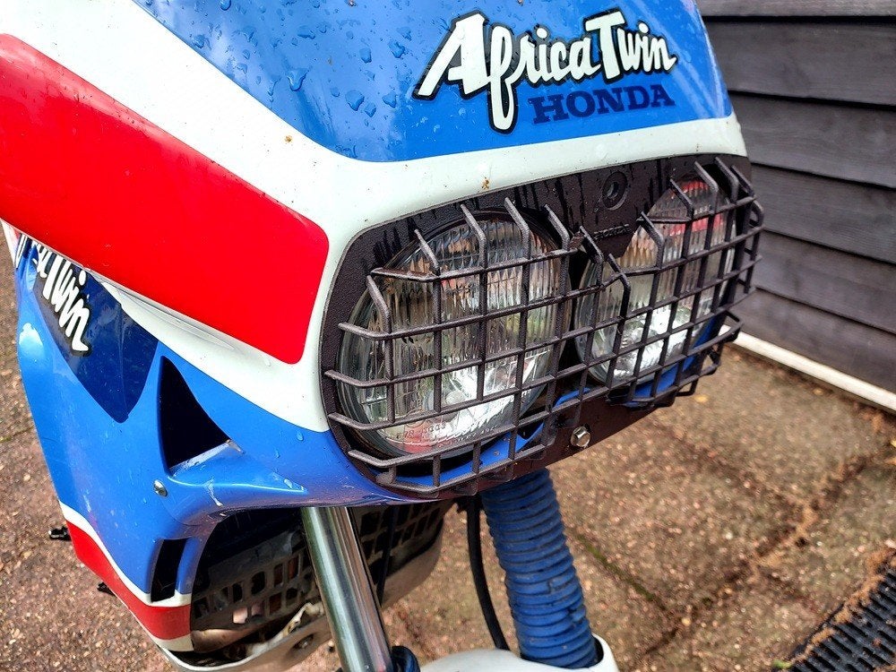 Honda XRV 650 Africa Twin koplamp rooster RD03 zwart plastic, Verzenden, Zo goed als nieuw