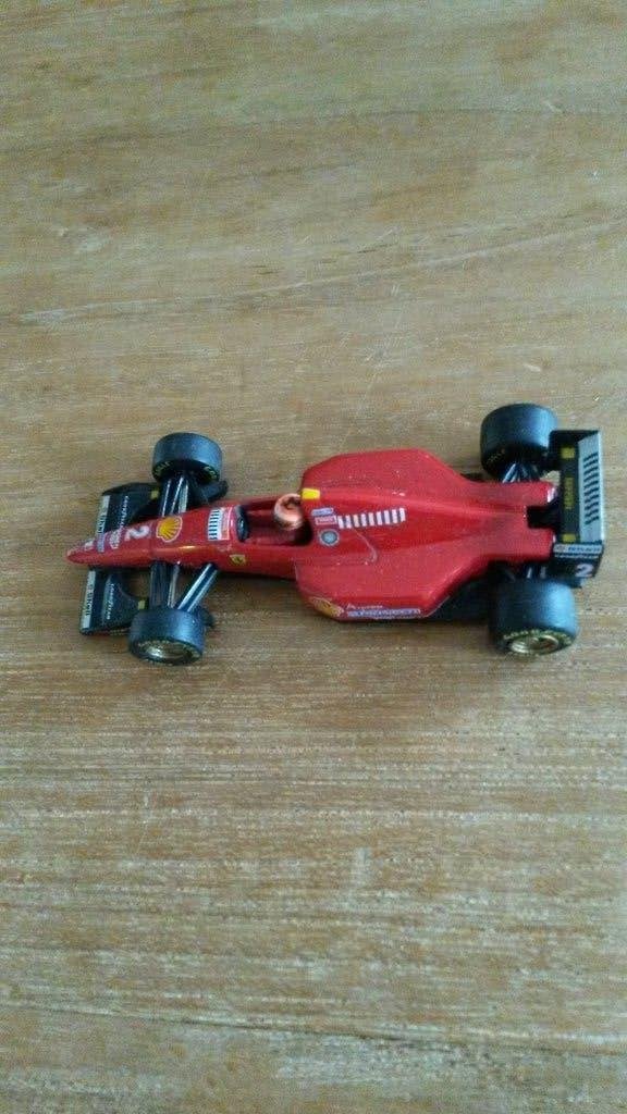 Ferrari F310 1996 Minichamps schaal 1:64 Eddie Irvine, Ophalen of Verzenden, Zo goed als nieuw, Auto, MiniChamps
