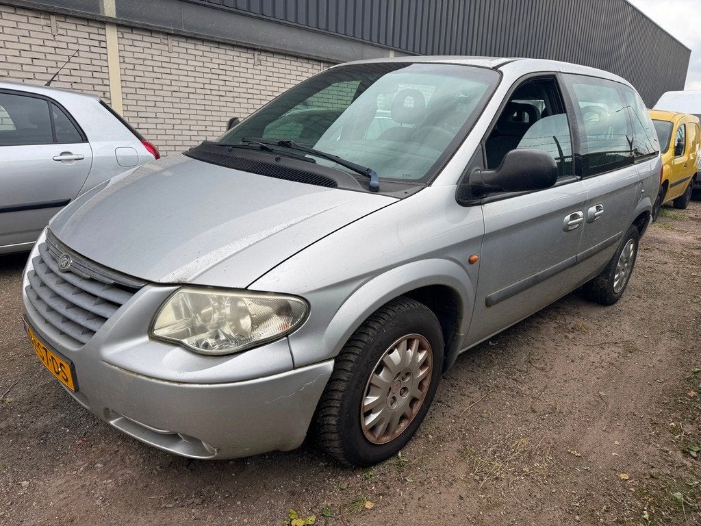 Chrysler Voyager 2.5 CRD SE Luxe 7 persoons Airco, Auto's, Chrysler, Gebruikt, Zwart, 241 €/maand, Origineel Nederlands