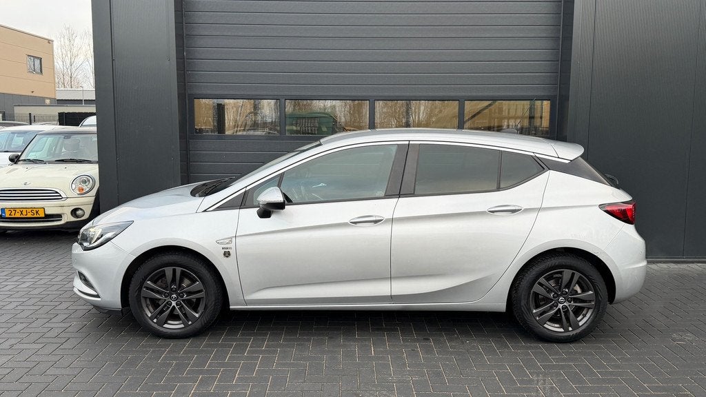 Opel Astra 1.4 Turbo 120 Jaar Edition Airco|Cruise, Gebruikt, Euro 6, 150 pk, 620 kg
