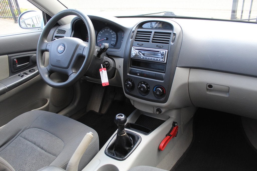 Kia Cerato 1.6-16V LX *Meeneemprijs*Airco/Radio-CD speler/El, Stof, Gebruikt, 4 cilinders, Blauw