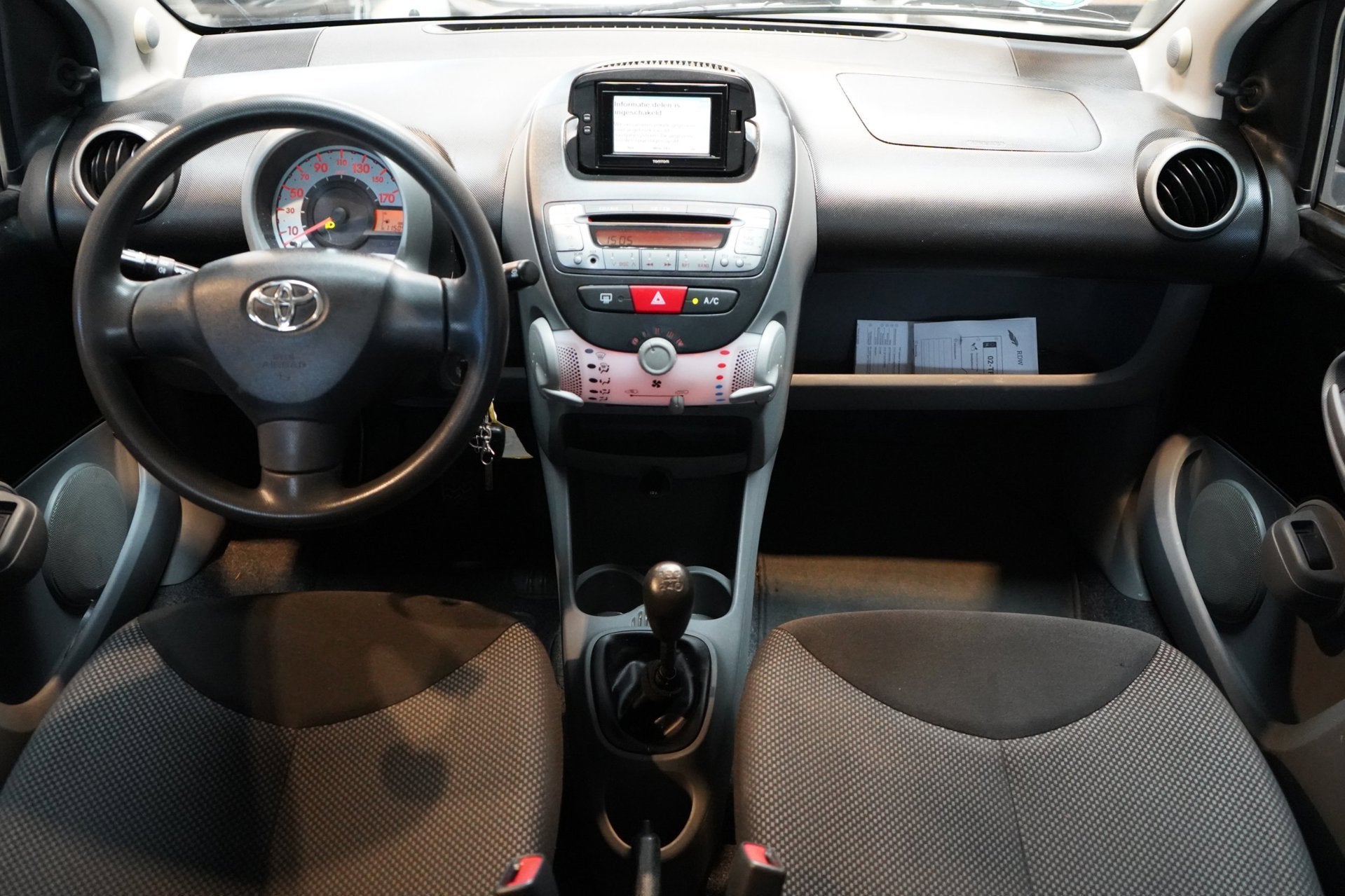 Toyota Aygo 1.0-12V Comfort Navigator | 1E EIGENAAR | NAP |, Auto's, Voorwielaandrijving, Euro 5, Stof, Gebruikt