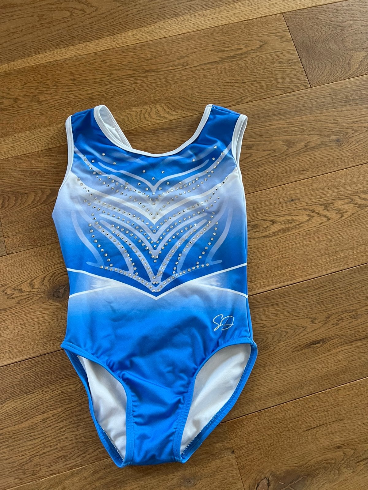 Blauw-wit turnpakje Sparkle met strass steentjes maat CLA, Maat 36 t/m 42, Ophalen of Verzenden, Zo goed als nieuw, Turnpak(je)
