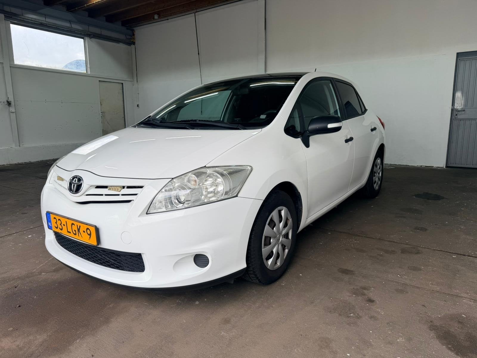 Toyota Auris 1.3 Vvt-i 5DR 2010 Wit, Auto's, Toyota, Voorwielaandrijving, 4 cilinders, Wit, Handgeschakeld