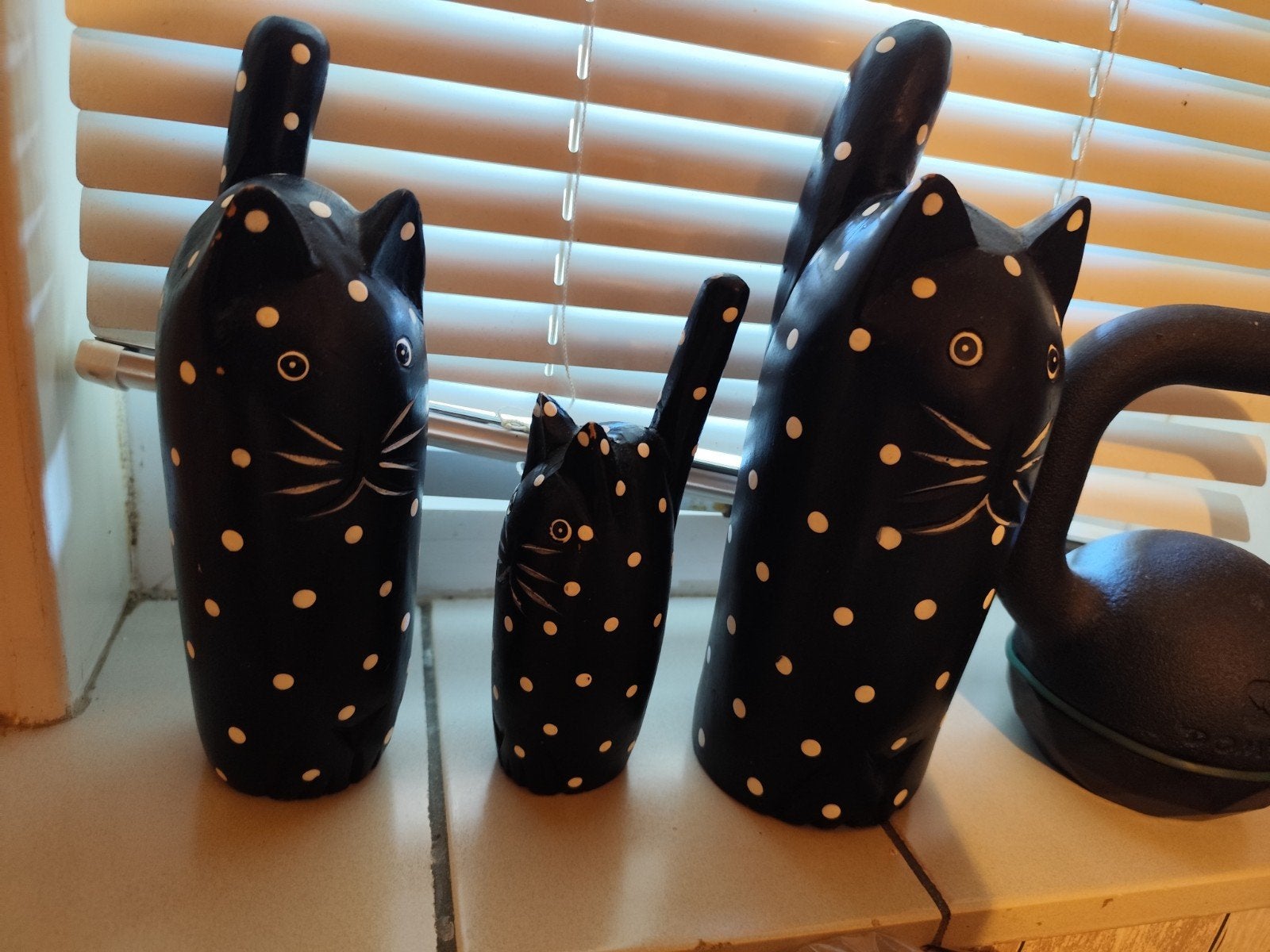 kattenbeeldjes, Ophalen
