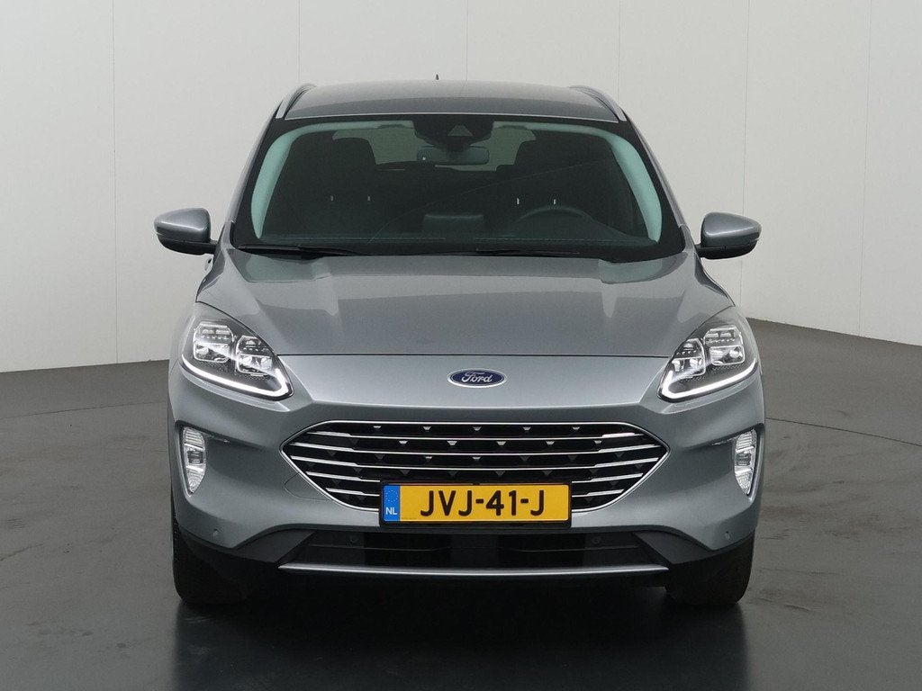 Ford Kuga 2.5 PHEV Titanium X | Navigatie | Stoelverwarming, Auto's, Ford, 14 kWh, Gebruikt, 4 cilinders, Leder en Stof