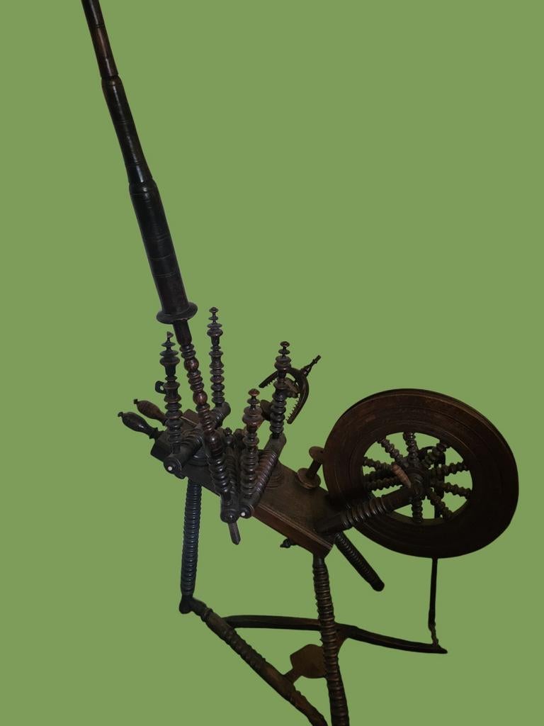 Houten spinnewiel, Ophalen