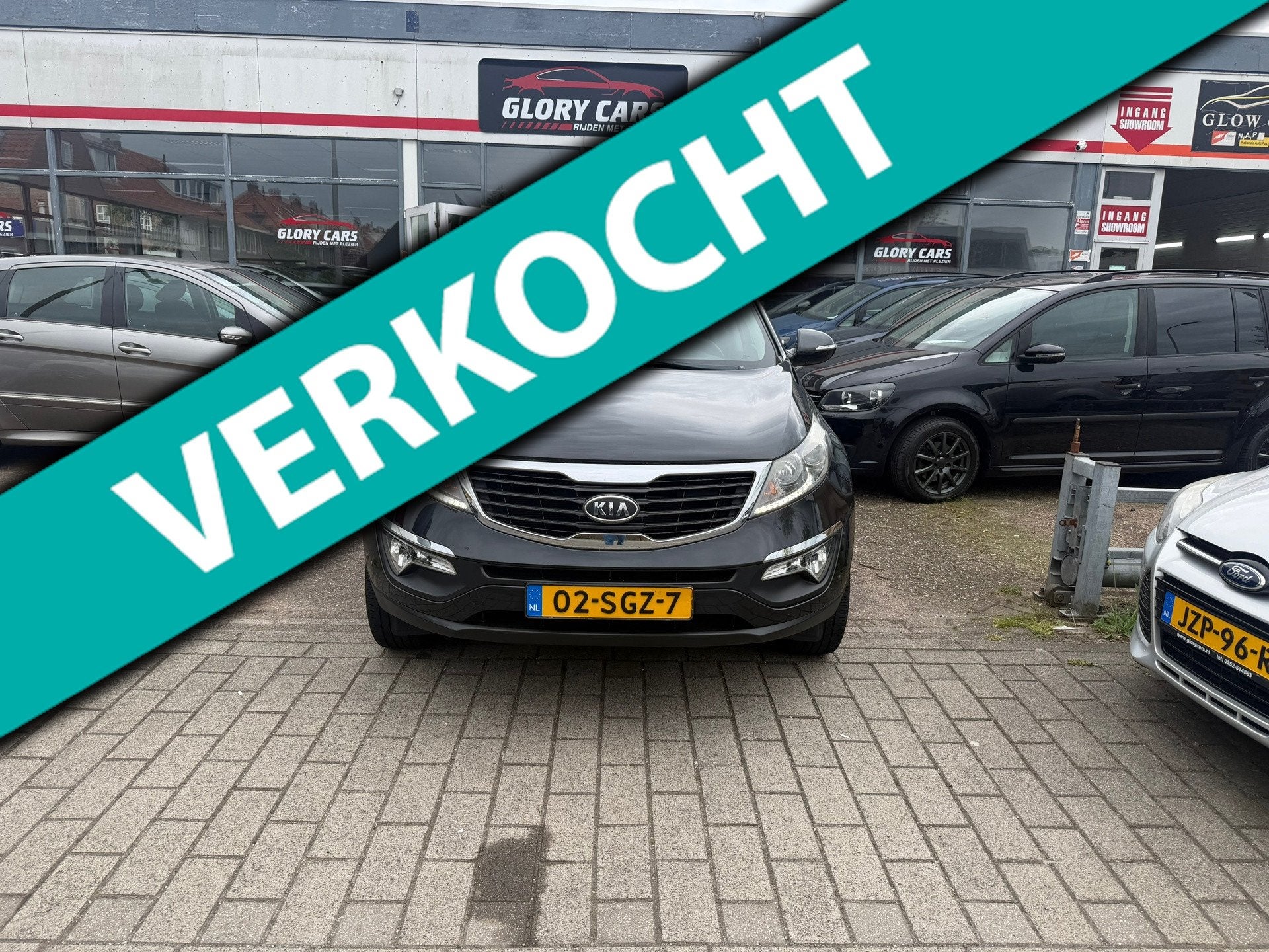 Kia Sportage 2.0 X-ecutive Plus Pack LEER-ACHTER PDC-TREKHAA, Auto's, Kia, Gebruikt, Zwart, 4 cilinders, Leder en Stof