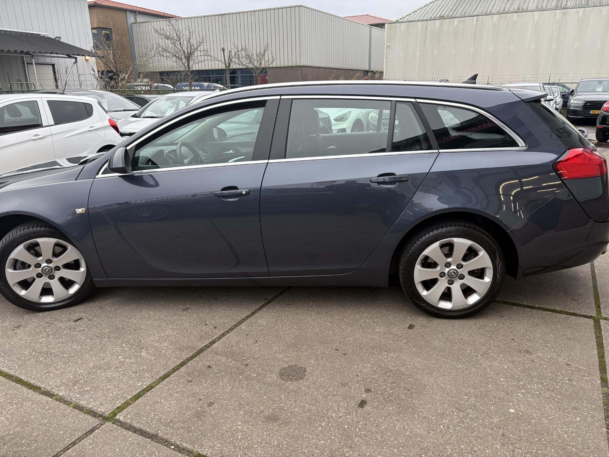 Opel Insignia Sports Tourer 1.6 T Edition, Auto's, Euro 5, Stof, Gebruikt, 4 cilinders