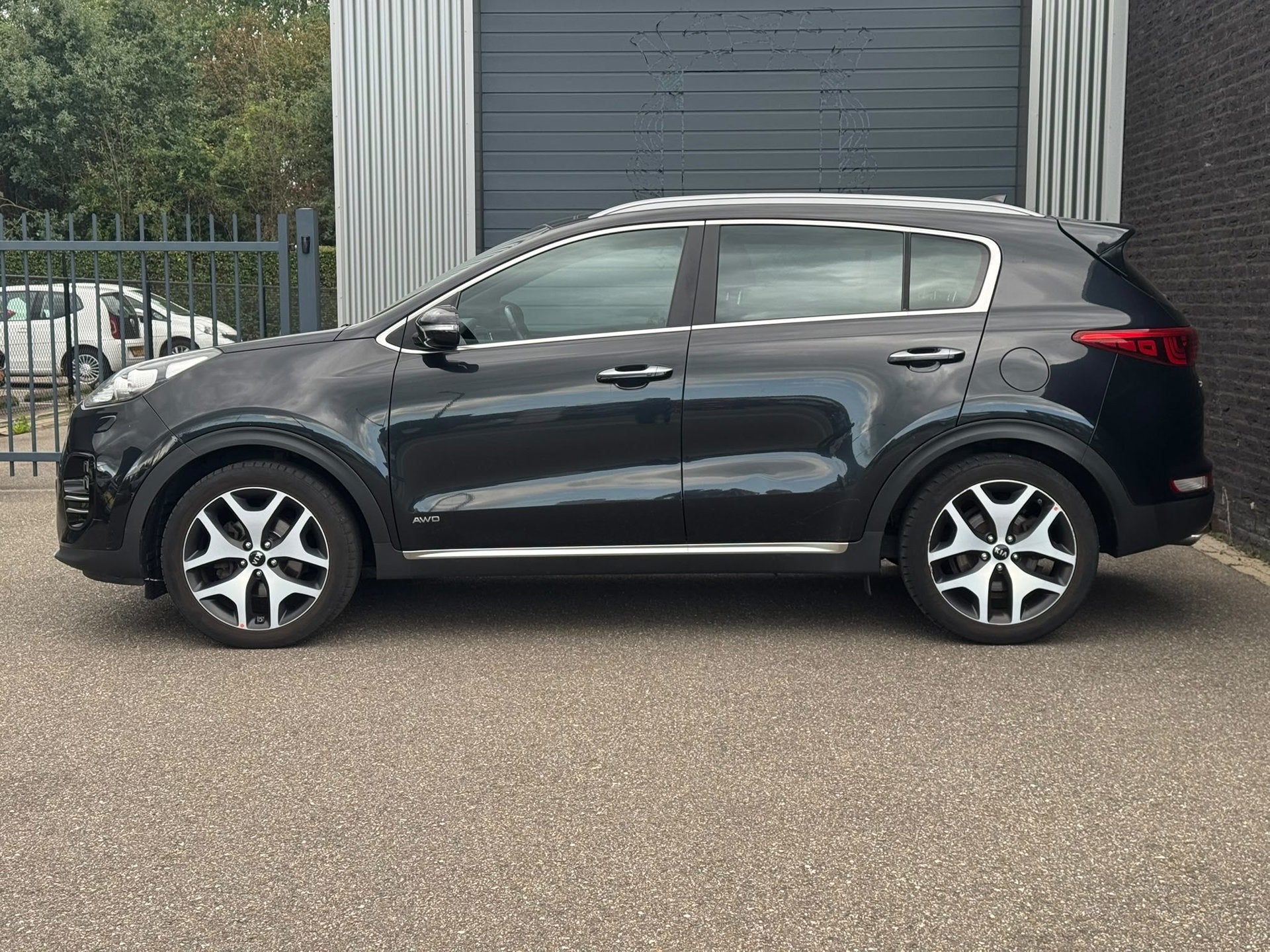 Kia Sportage 1.6 T-GDI 4WD GT-Line PlusLine Nap|Ecc|Camera, Auto's, Gebruikt, 4 cilinders, Zwart, Bedrijf