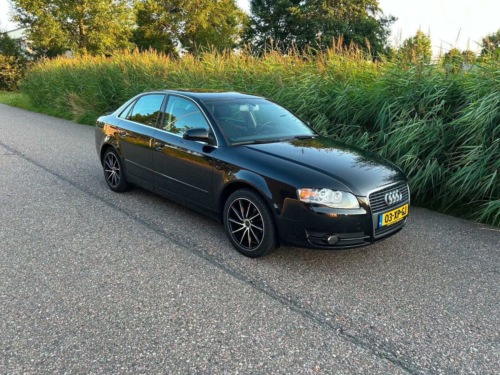 Audi A4 2.0 96KW AUT 2007 Zwart, Auto's, Zwart, 4 cilinders, 1984 cc, A4