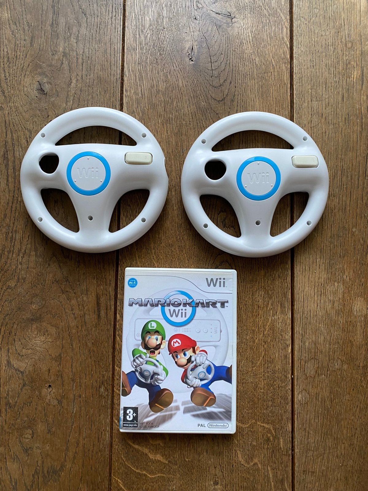 Mario Kart Wii + 2 originele stuurtjes, Computers en Software, Ophalen of Verzenden, Zo goed als nieuw