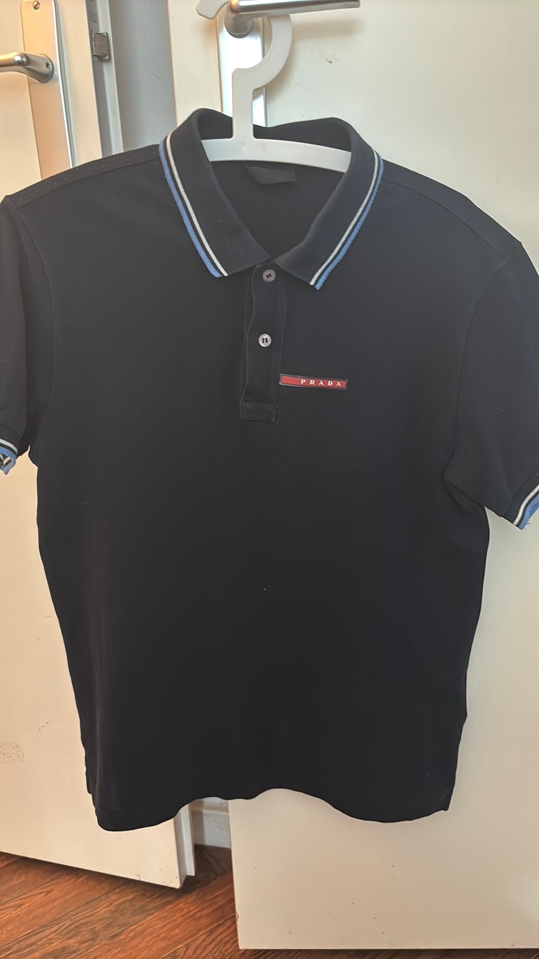 Donkerblauwe heren polomerk Prada, Kleding | Heren, Ophalen of Verzenden, Zo goed als nieuw, Blauw