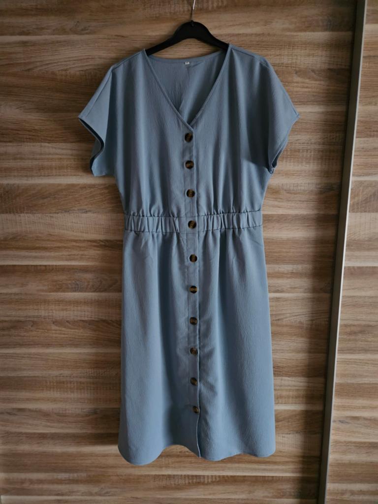 Turquoise jurk maat m, Kleding | Dames, Jumpsuits, Ophalen of Verzenden, Zo goed als nieuw, Maat 38/40 (M), Blauw