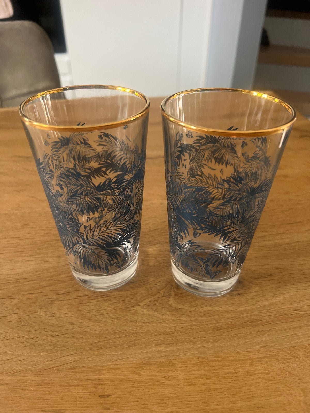 Set van 2 glazen met tropische print en gouden rand, Huis en Inrichting, Ophalen, Glas of Glazen, Modern, Glas