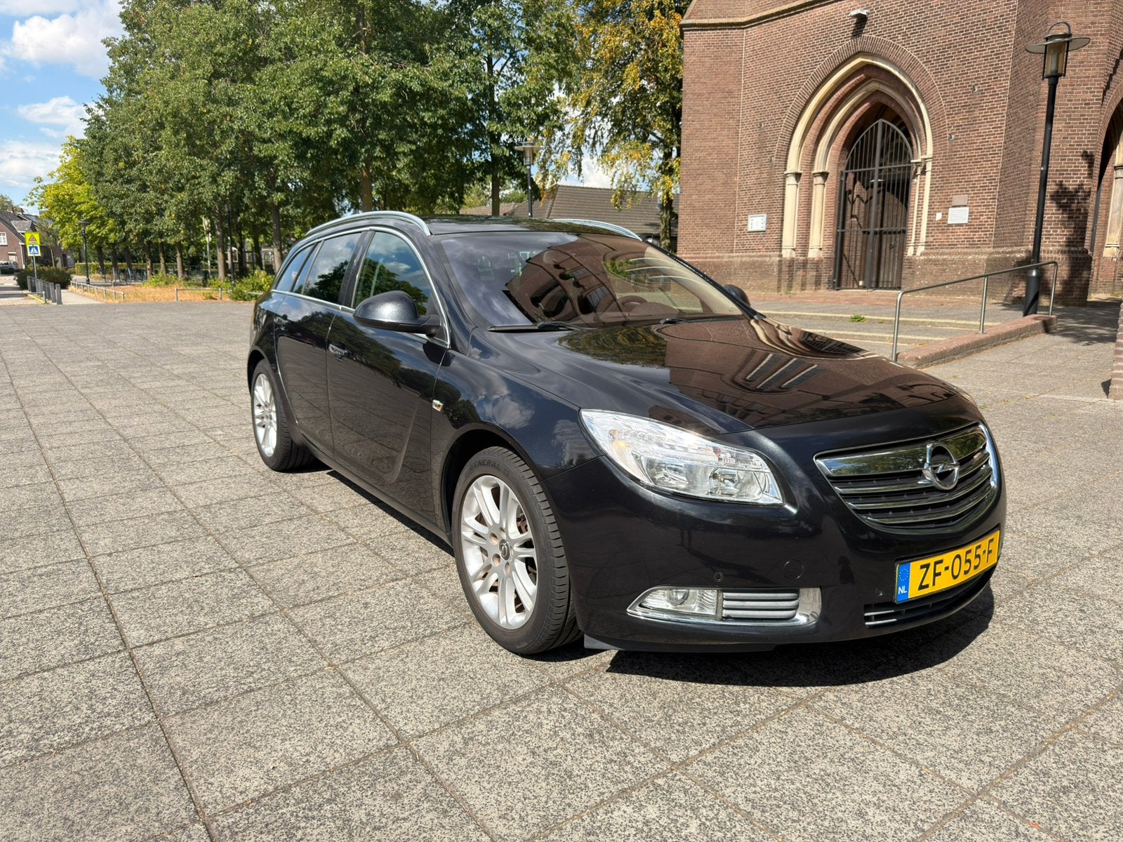 Opel Insignia 1.8 Sports Tourer 2011 Zwart Airco Leer PDC, Auto's, Opel, 1350 kg, 4 cilinders, 1796 cc, Zwart