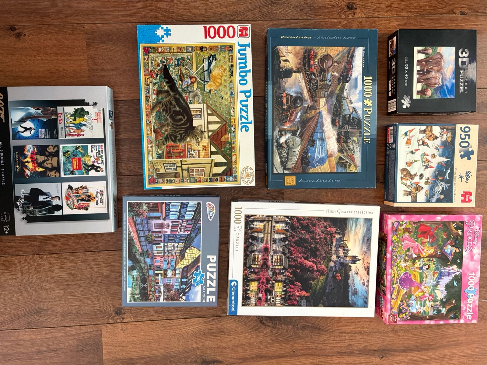 8 puzzels 1000 stukjes, Hobby en Vrije tijd, Ophalen, 500 t/m 1500 stukjes, Zo goed als nieuw