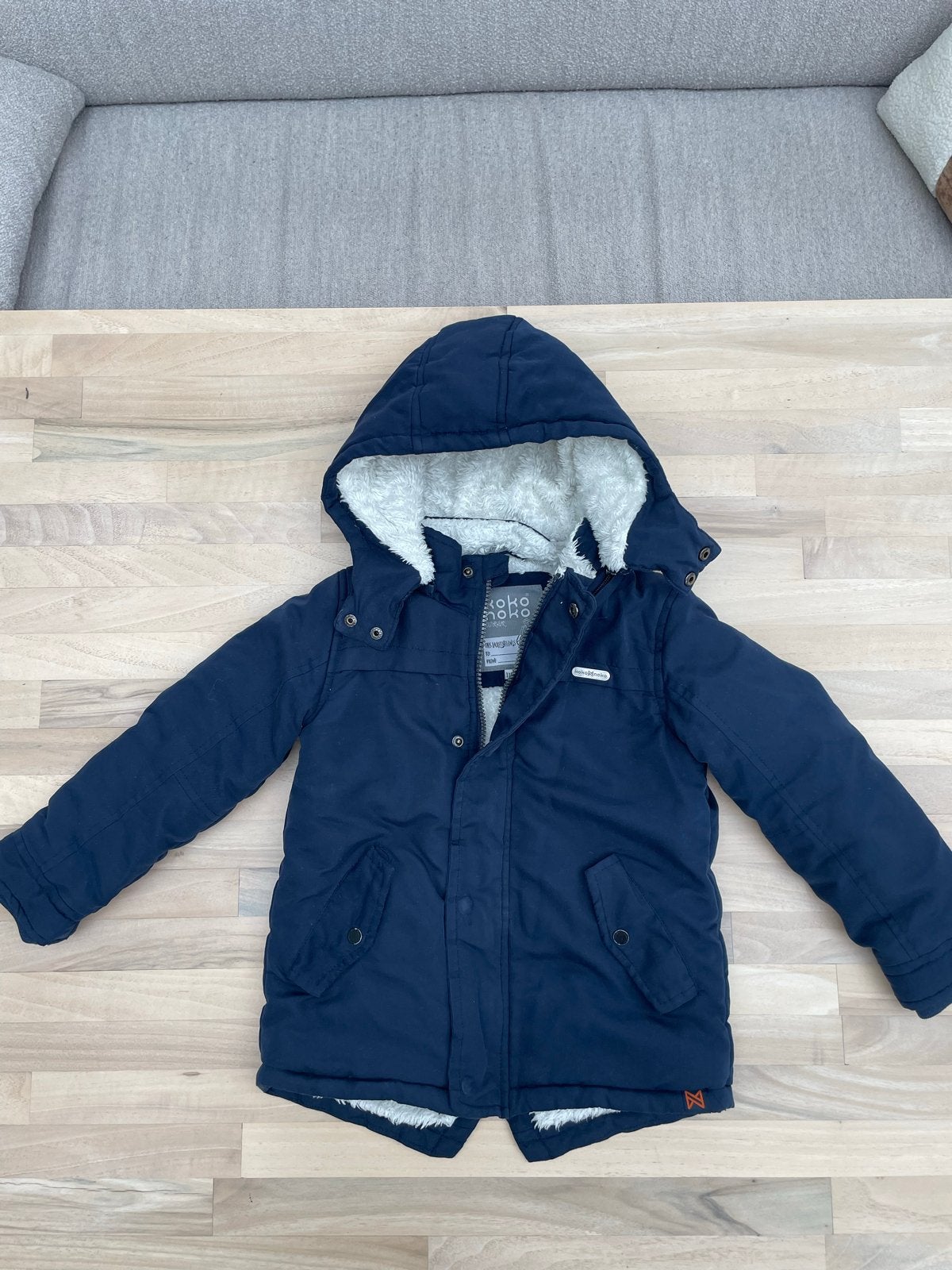Donkerblauwe winterjas van koko noko, maat 110, Ophalen of Verzenden, Gebruikt, Jongen of Meisje