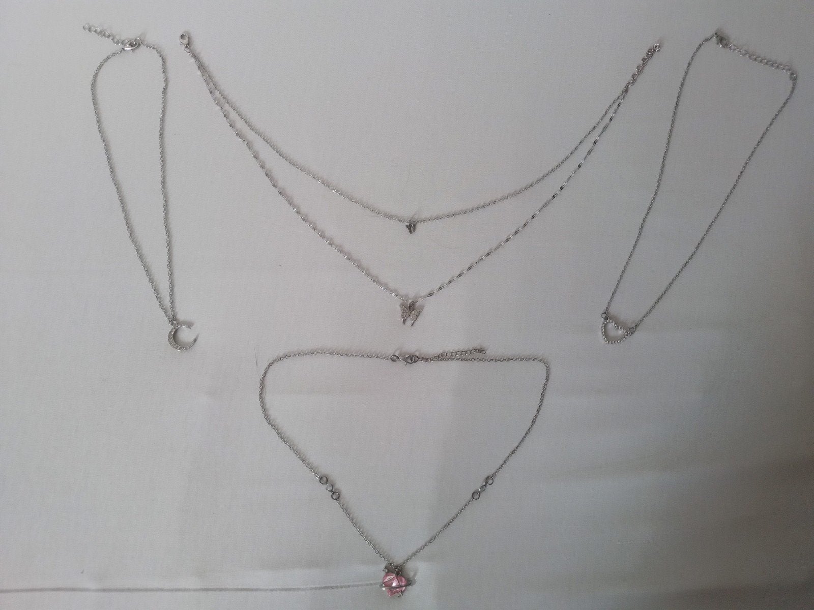 Leuke zilverkleurige kettingen met hangers, Ophalen of Verzenden, Zilver, Overige materialen