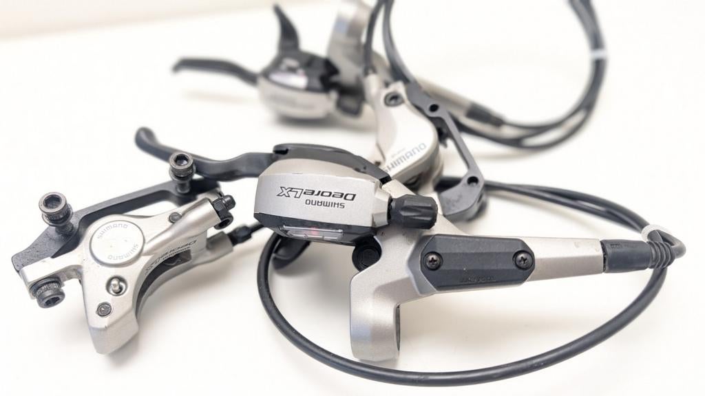 Shimano Deore LX dual control sti+hyd.rem, Fietsen en Brommers, Ophalen of Verzenden, Zo goed als nieuw