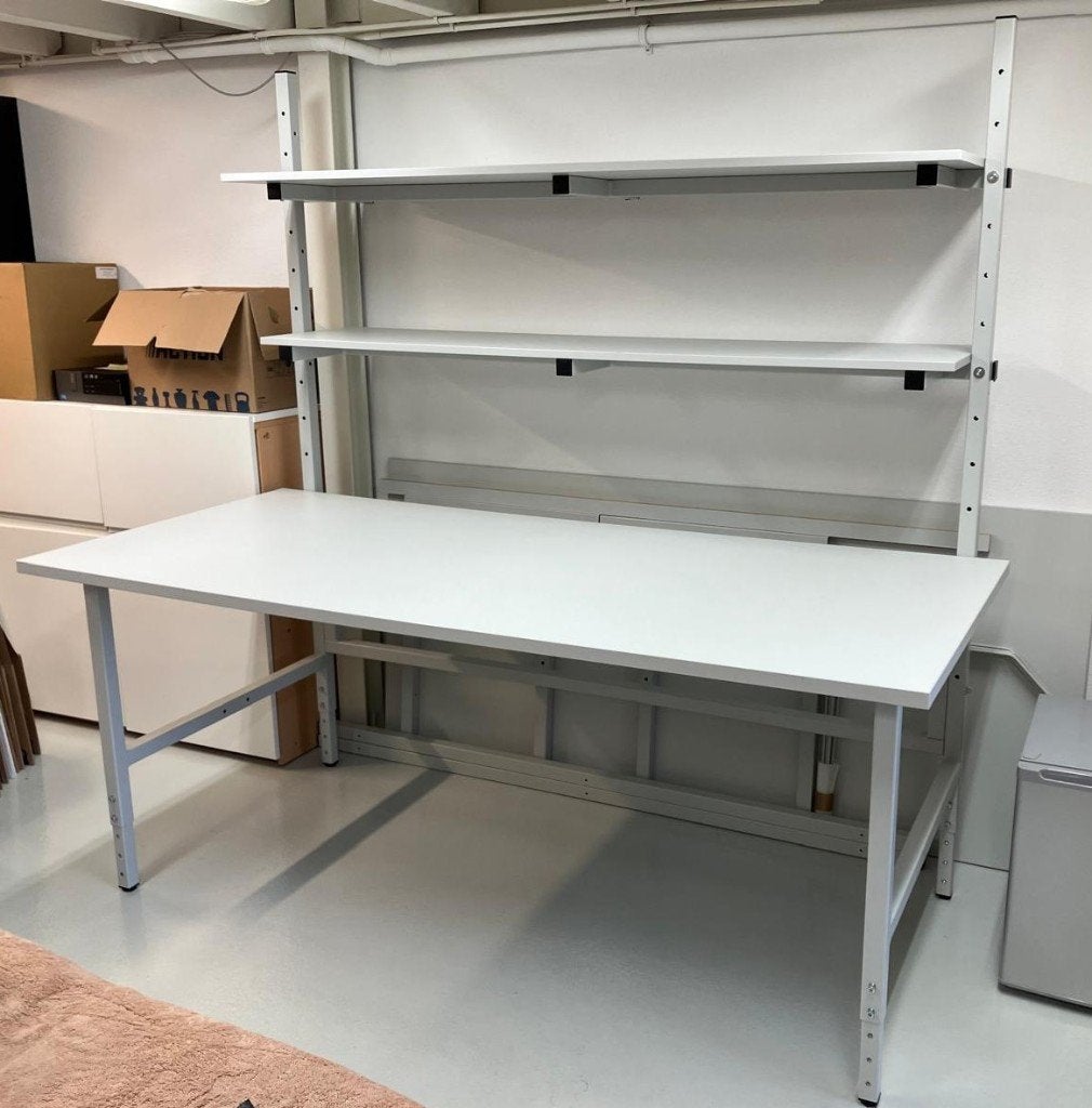 In hoogte verstelbare inpaktafel, dubbelzijdig, compleet., Ophalen