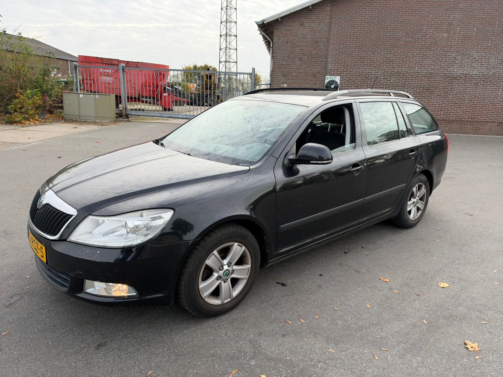 Skoda Octavia 1.6 TDI 77KW Combi Greentech 2011 Zwart, Auto's, Voorwielaandrijving, Euro 5, Stof, 4 cilinders