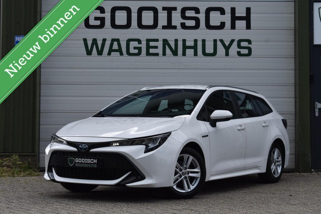 Toyota Corolla Touring Sports 1.8 Hybrid Active | Trekhaak |, Auto's, Toyota, 1345 kg, 450 kg, 4 cilinders, Met garantie (alle)