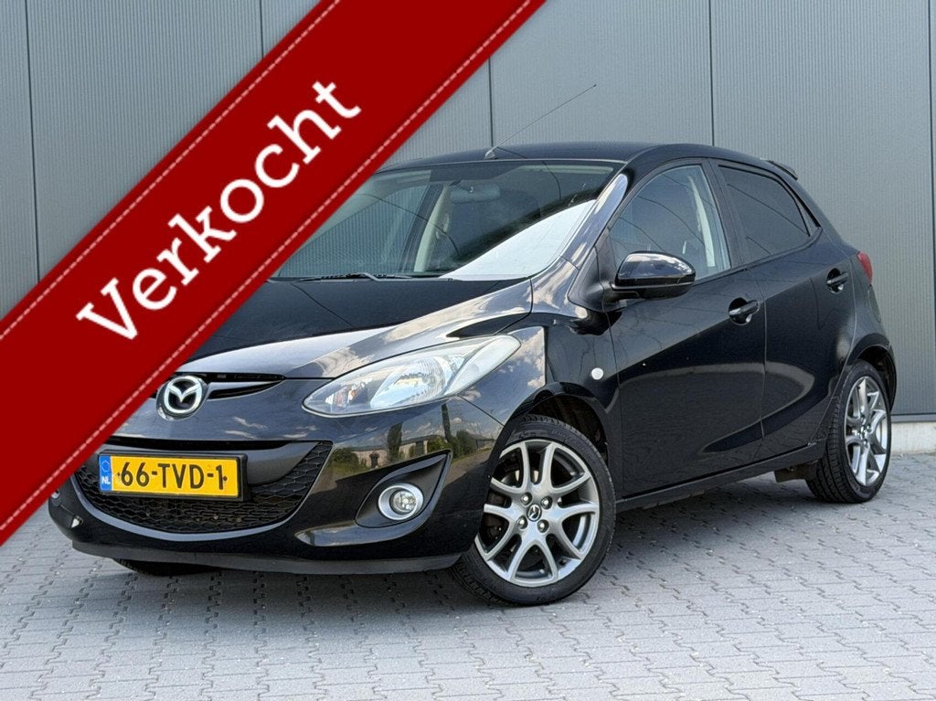 Mazda 2 1.3 BIFUEL Navigator GT 1e Eigenaar - Navi - Airco -, Voorwielaandrijving, Euro 5, Stof, Zwart