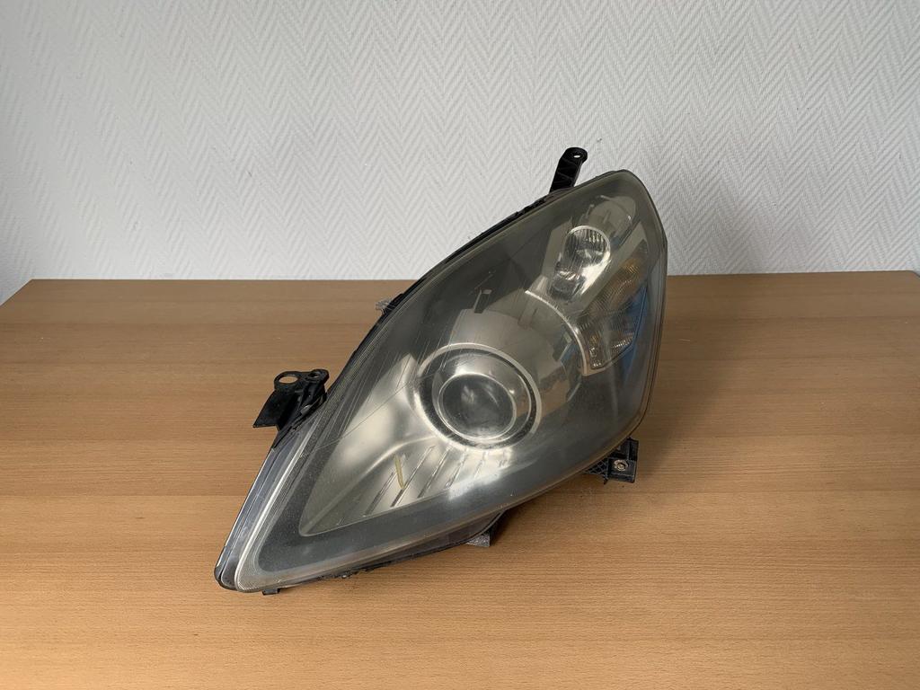 koplamp xenon links opel zafira B 2005 tot 2012 24451044, Auto-onderdelen, Gebruikt, -, -, Opel
