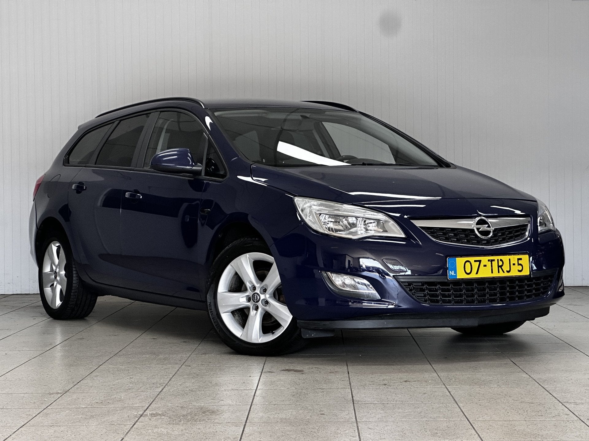 Opel Astra Sports Tourer 1.4 Turbo Business Edition/ Trekhaa, Auto's, Voorwielaandrijving, Gebruikt, 4 cilinders, Blauw