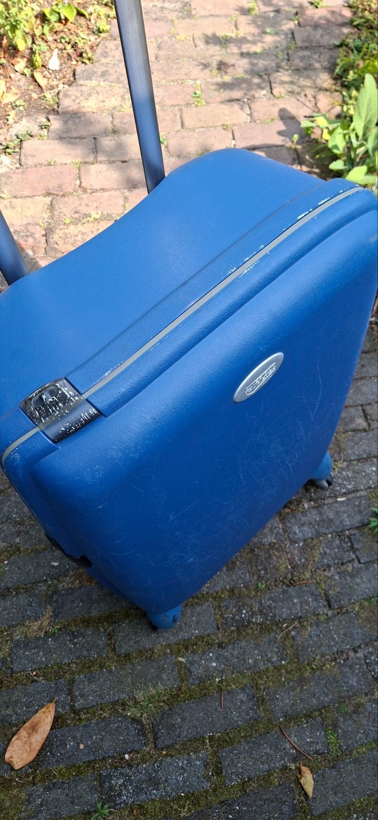 Blauwe koffer met uitschuifbare handgreep en wieltjes, Ophalen, Wieltjes, Gebruikt, Hard kunststof