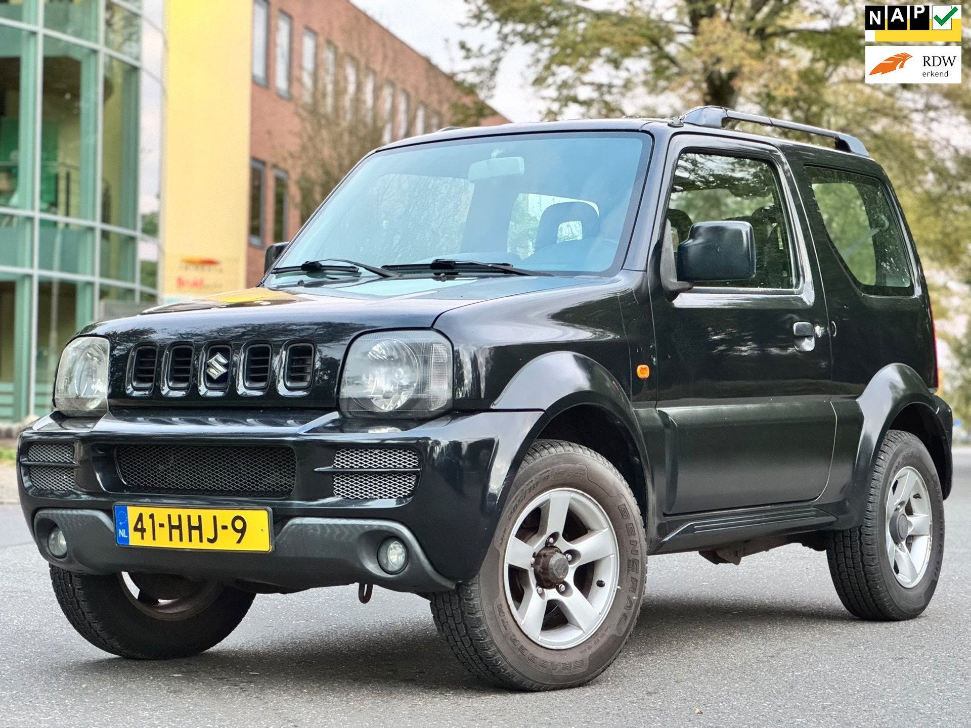 Suzuki Jimny 1.3 Exclusive|4WD|AIRCO|CRUISE|ELEKRAMEN|NAP|BO, Dealer onderhouden, 86 pk, 4 stoelen, Zwart