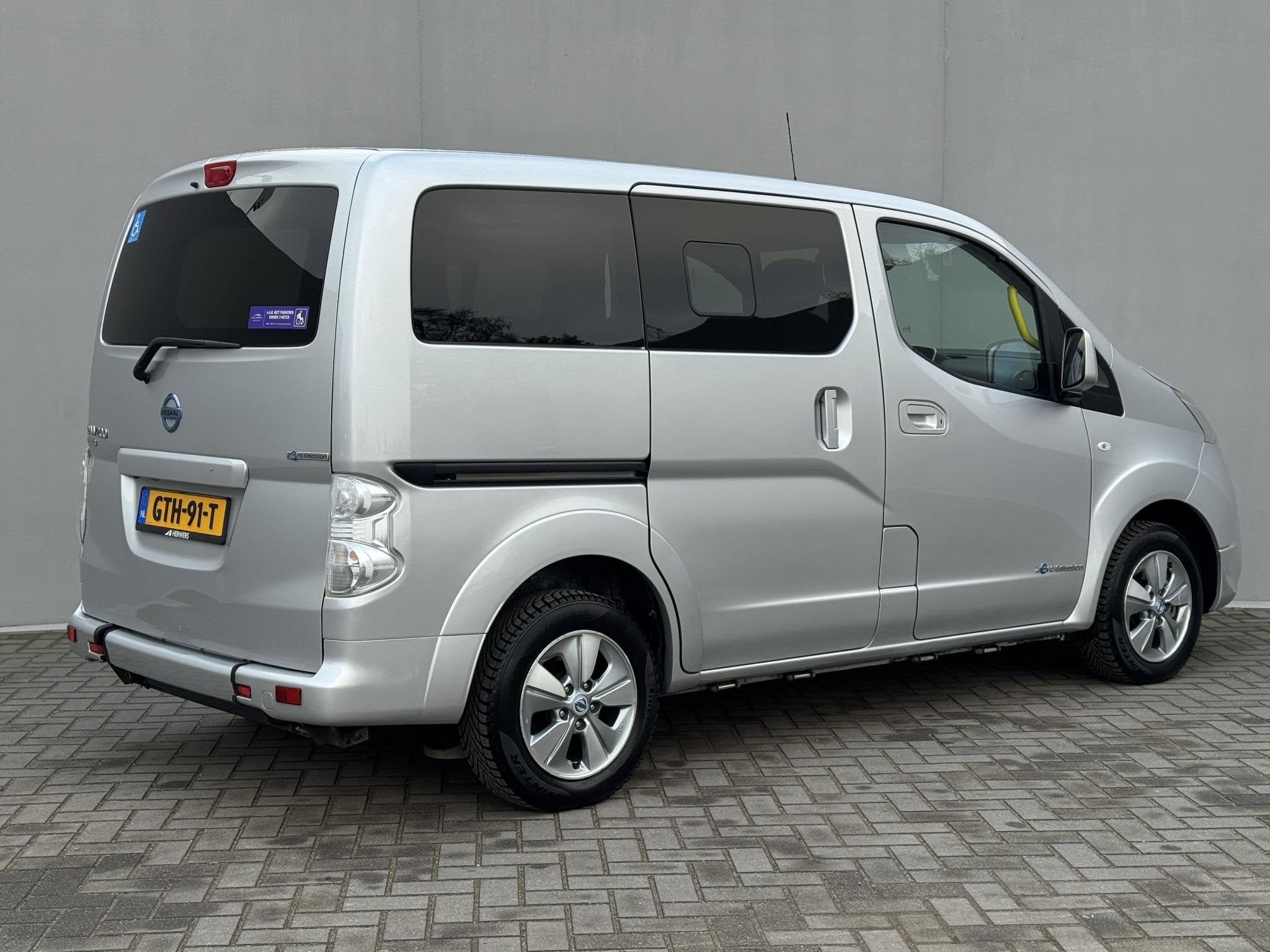 Nissan e-NV200 Evalia Connect Edition / Invalide Auto - Rols, Auto's, Nissan, Stof, Gebruikt, Stoelverwarming, 1594 kg
