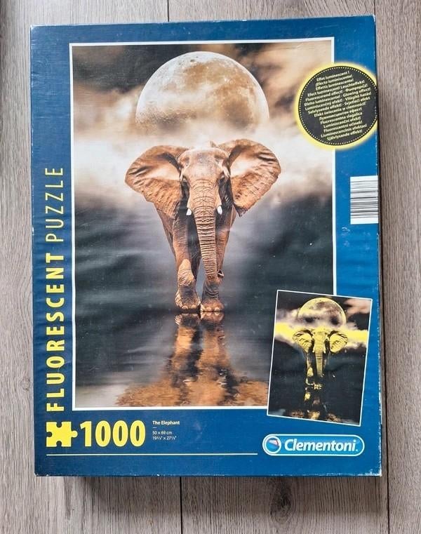 Clementoni glow in the dark puzzel olifant 1000 stuks, Ophalen of Verzenden, 500 t/m 1500 stukjes, Zo goed als nieuw, Legpuzzel