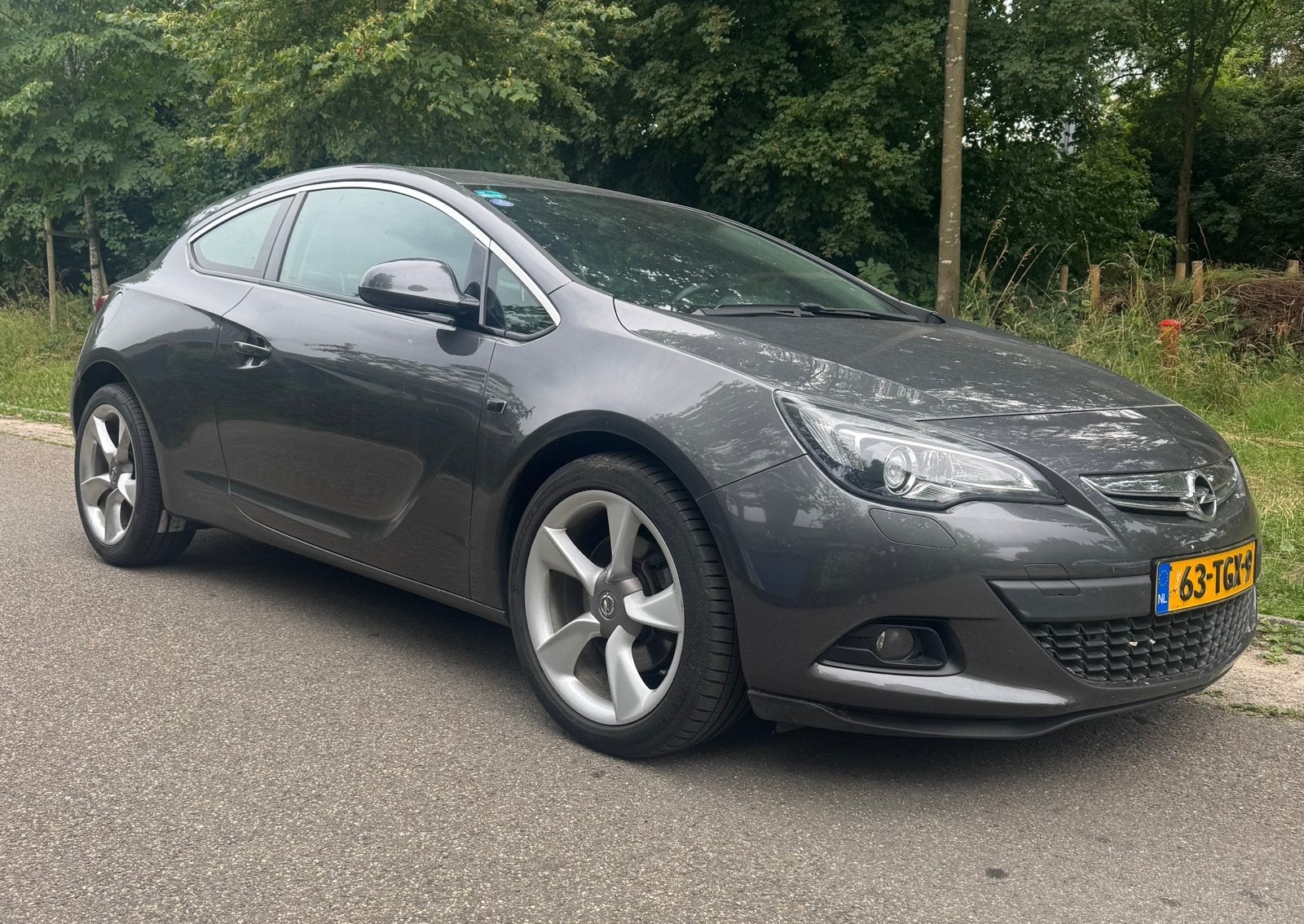 Opel Astra 1.4 turbo sport 16V 103KW GTC 2012 Grijs nap, Voorwielaandrijving, 1350 kg, 4 cilinders, 700 kg