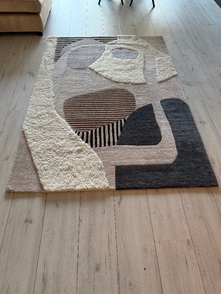 Handgetuft wollen vloerkleed met hoog-laag structuur