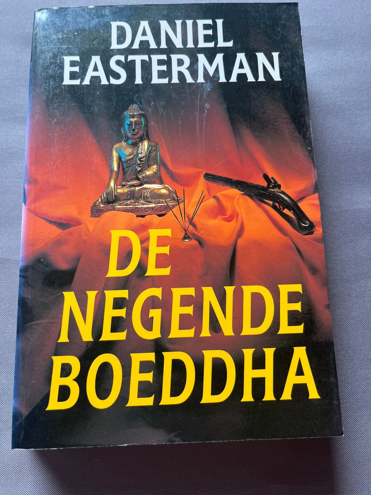 De Negende Boeddha - Daniel Easterman, Ophalen of Verzenden, Gelezen, Nederland