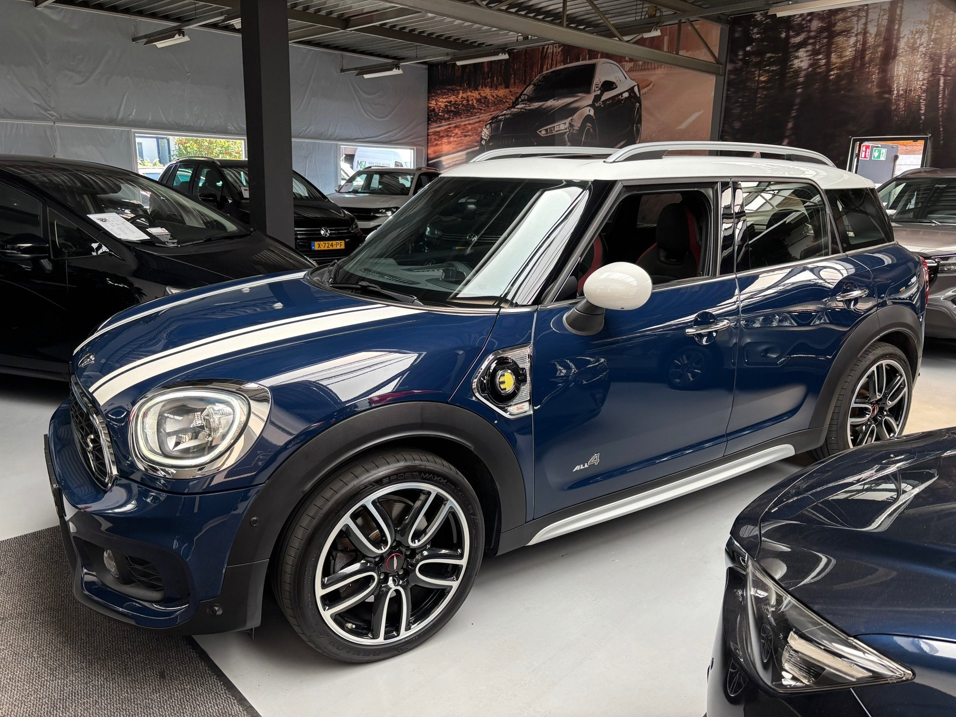 Mini Countryman 1.5 Cooper S E ALL4 John Works / Camera / Pa, Auto's, Mini, 136 pk, Gebruikt, Met garantie (alle), Blauw