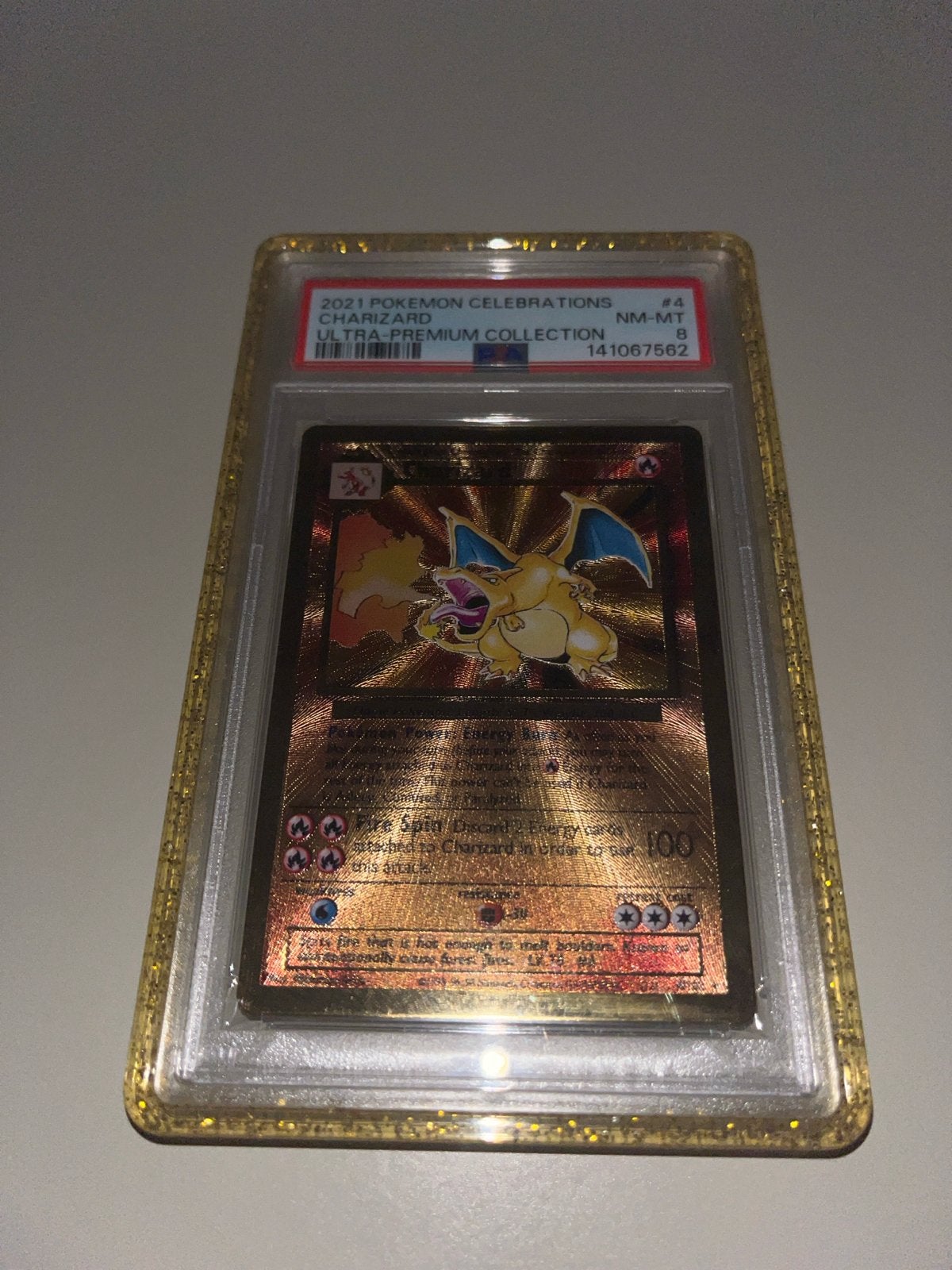 PSA 8 2021 Pokémon Celebrations Charizard Ultra-Premium, Ophalen of Verzenden, Zo goed als nieuw, Losse kaart, Foil