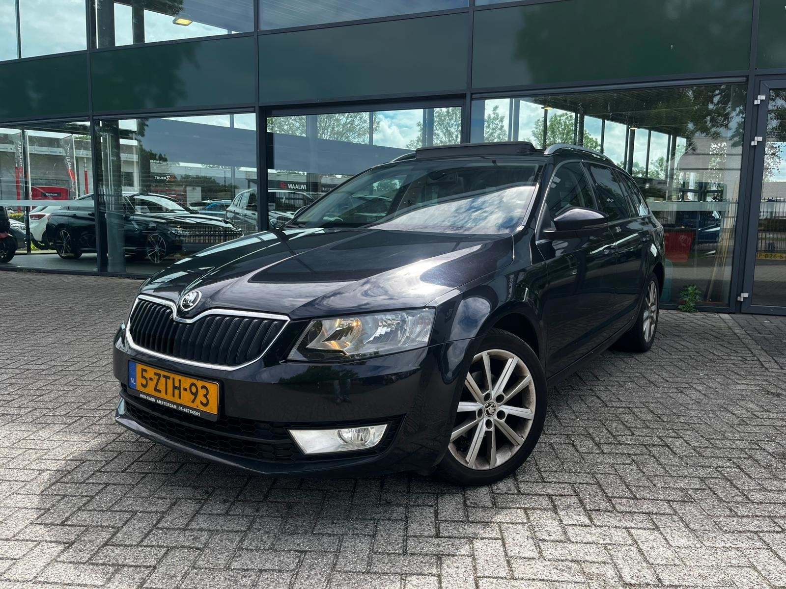 Skoda Octavia Combi 1.6 TDI Ambition Businessline (Automaat,, Auto's, Skoda, Euro 5, Gebruikt, 4 cilinders, Lichtsensor
