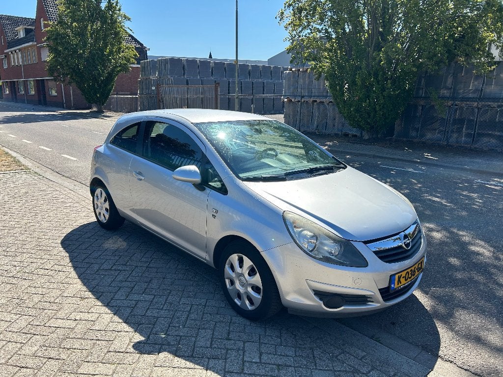 Opel Corsa 1.2 Ecoflex 51KW 3D 2010 Grijs, Auto's, Voorwielaandrijving, 450 kg, 40 €/maand, 1229 cc