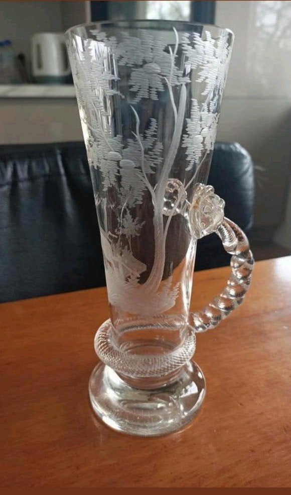 Geslepen glas met hert, Ophalen