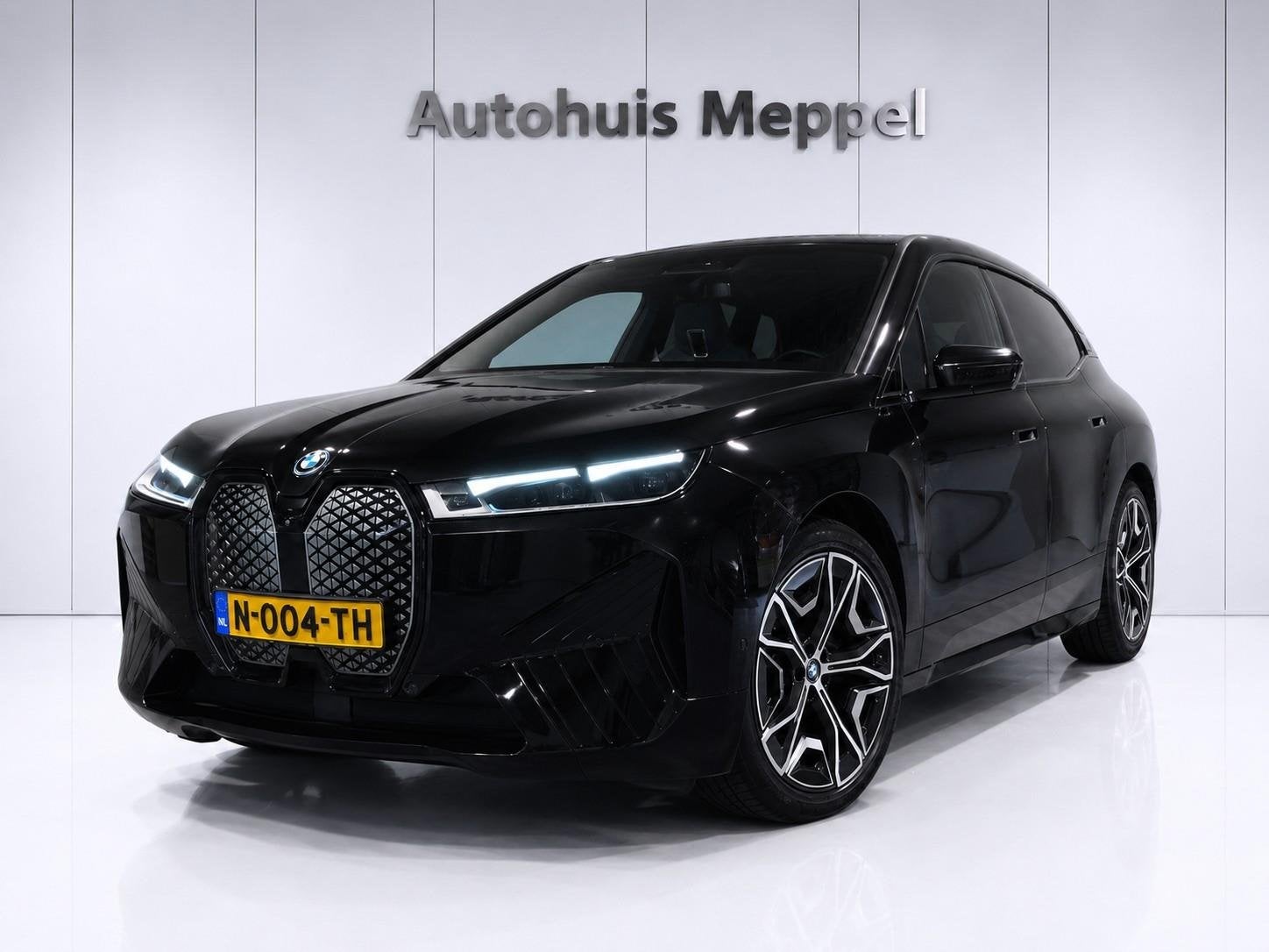 BMW iX xDrive40 SOH 99.9%*SportPakket*Laserlicht*Trekhaak*H/, Automaat, 34 min, Gebruikt, Zwart