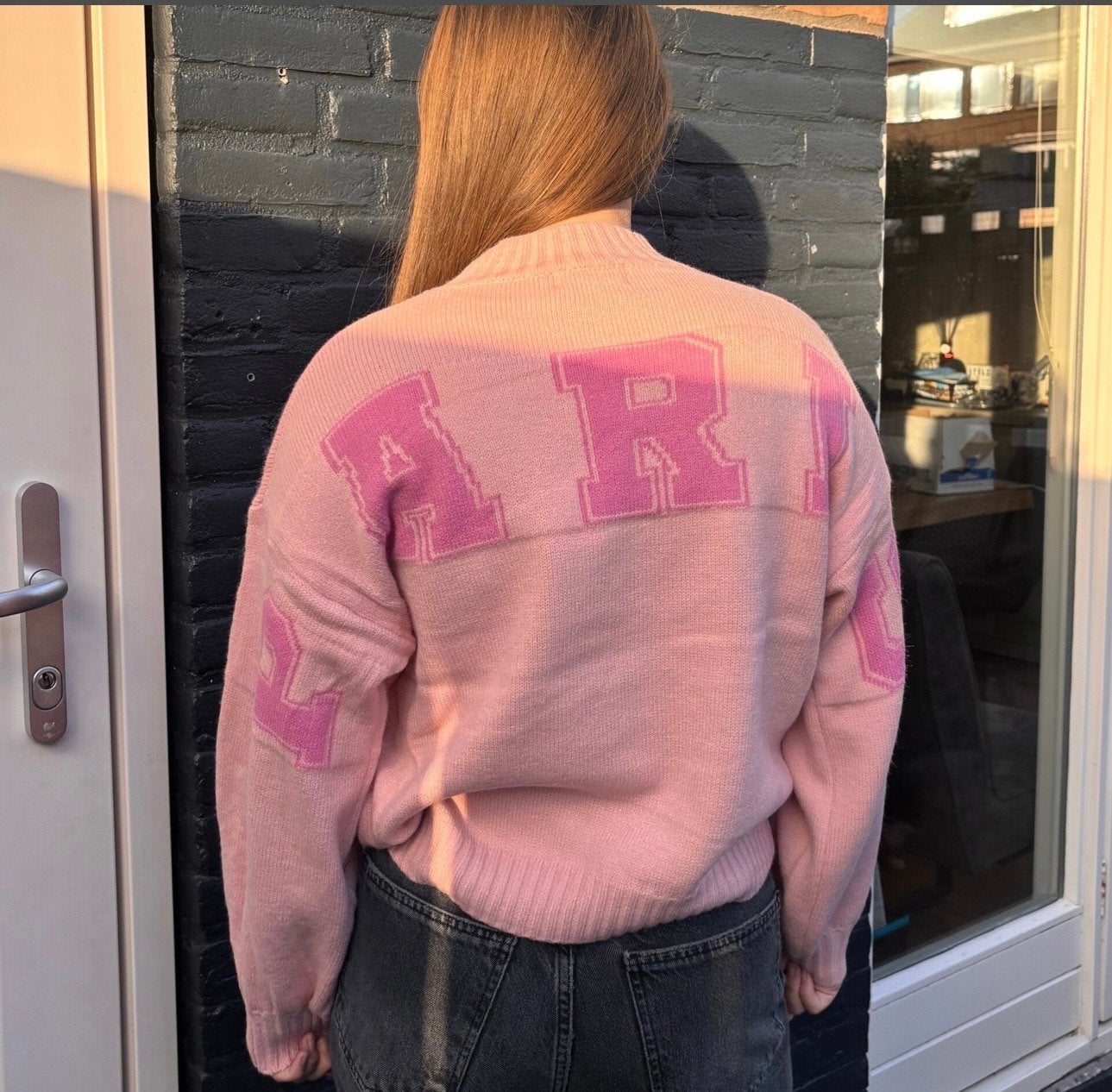 Roze trui met 'Paris' op de rug, maat L/XL, Kleding | Dames, Ophalen of Verzenden, Nieuw, Maat 42/44 (L), Roze