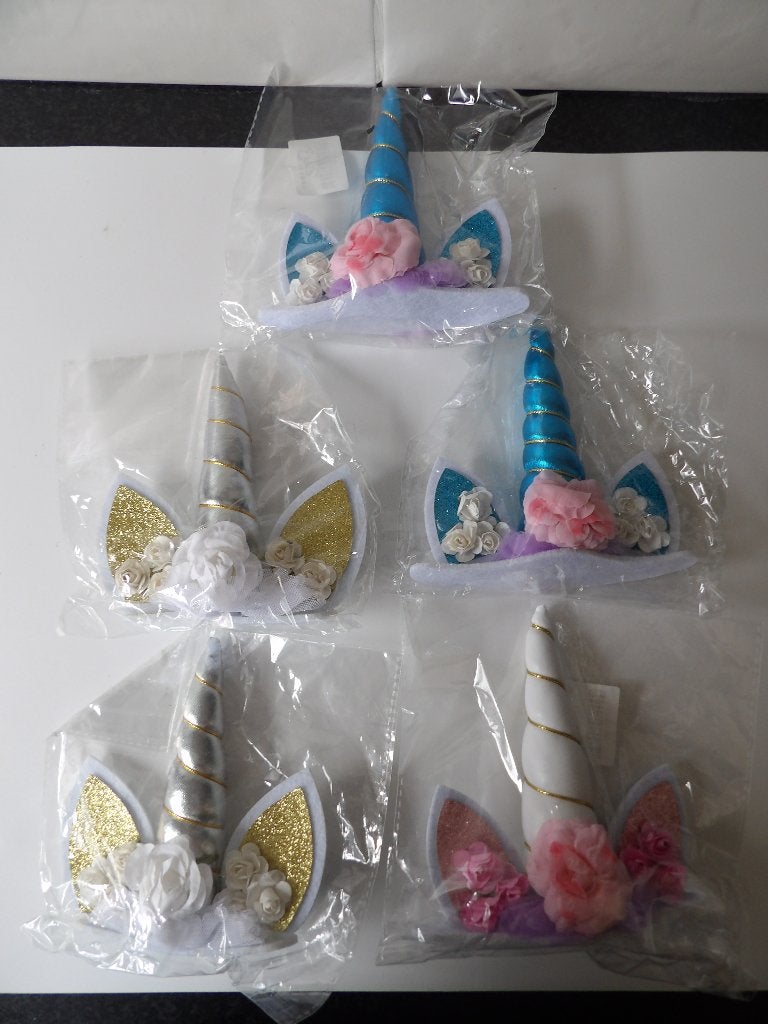 nieuw 5x unicorn hoorns (ik deed ze op een prikker, Ophalen of Verzenden, Nieuw, Taarten, Versiering