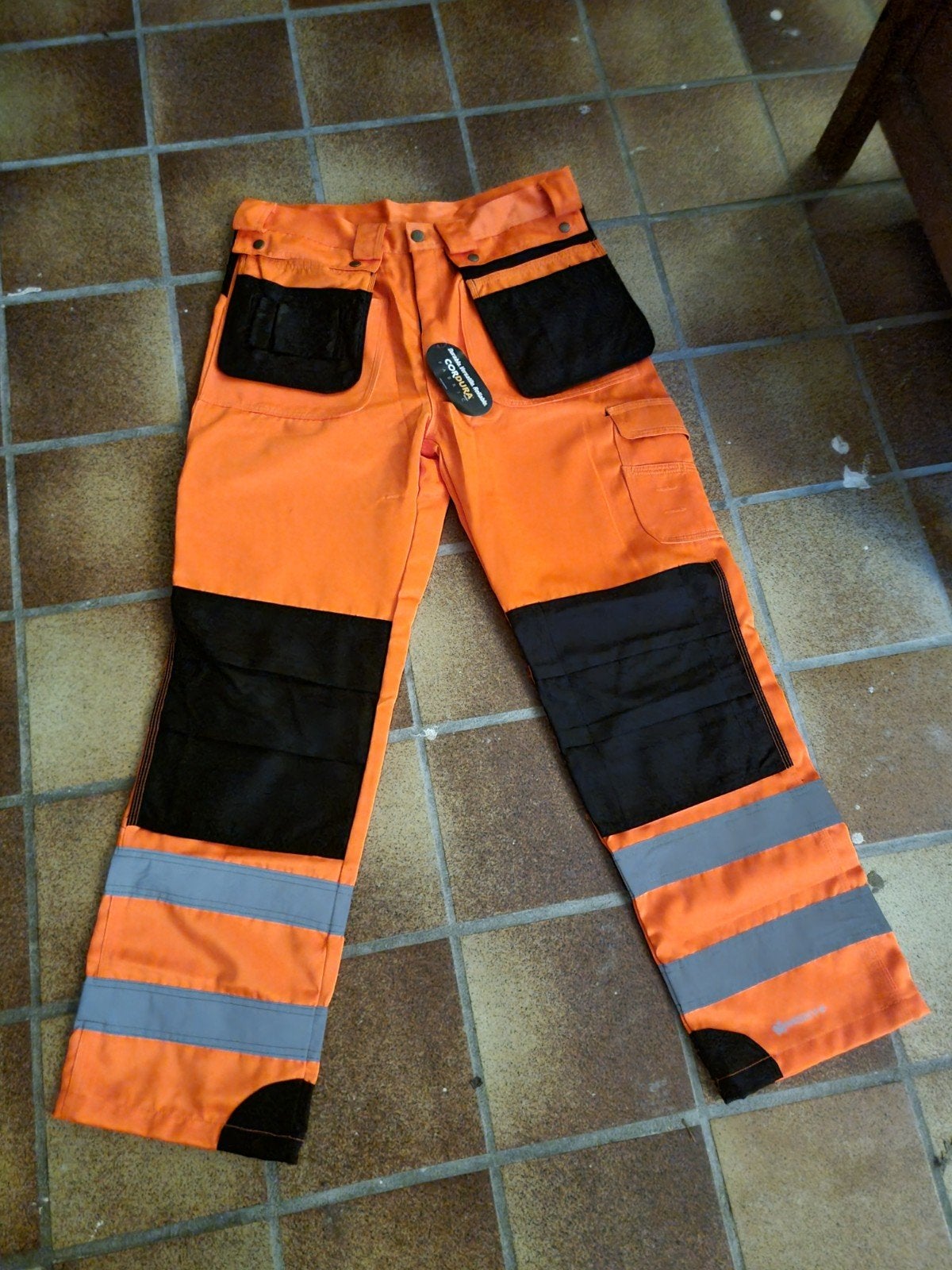 Nieuwe oranje werkbroek met reflecterende strepen, Nieuw, Ophalen of Verzenden, Broek, Heren