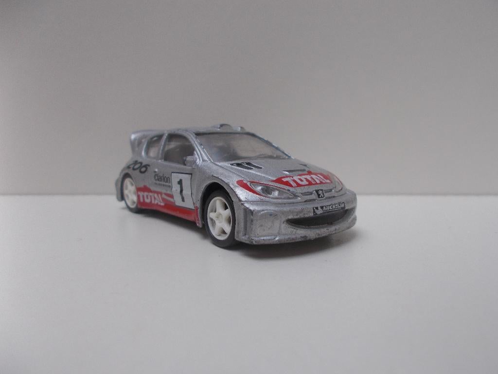 6103 Peugeot 206 WRC Norev, Hobby en Vrije tijd, Ophalen of Verzenden, Gebruikt, Auto