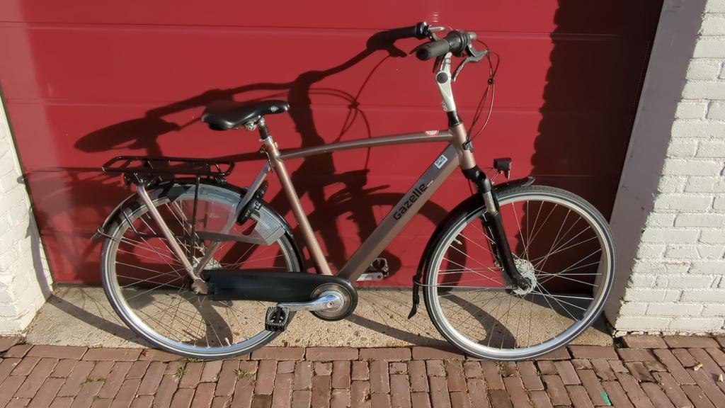 Gazelle orange c7+ heren fiets 57cm 7 versnellingen, Versnellingen, Zo goed als nieuw, Gazelle, 56 cm of meer