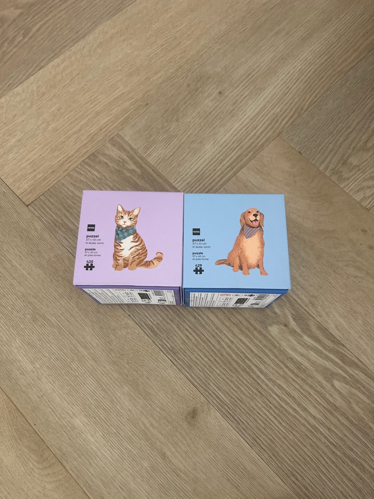 Hema Puzzel Kat en Hond - 425 en 429 stukjes, Hobby en Vrije tijd, Ophalen, 500 t/m 1500 stukjes, Zo goed als nieuw, Legpuzzel